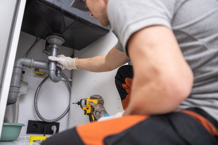 Practical tips for clearing a clogged drain safely using simple and effective plumbing methods