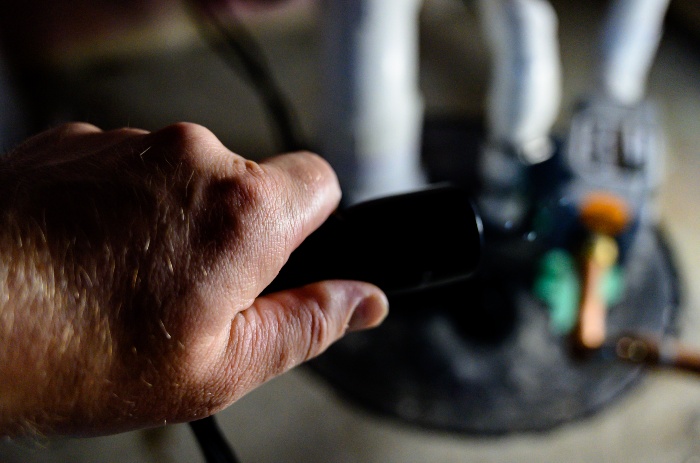 Sump pump cord held near the outlet during the outage issue in Naperville, IL