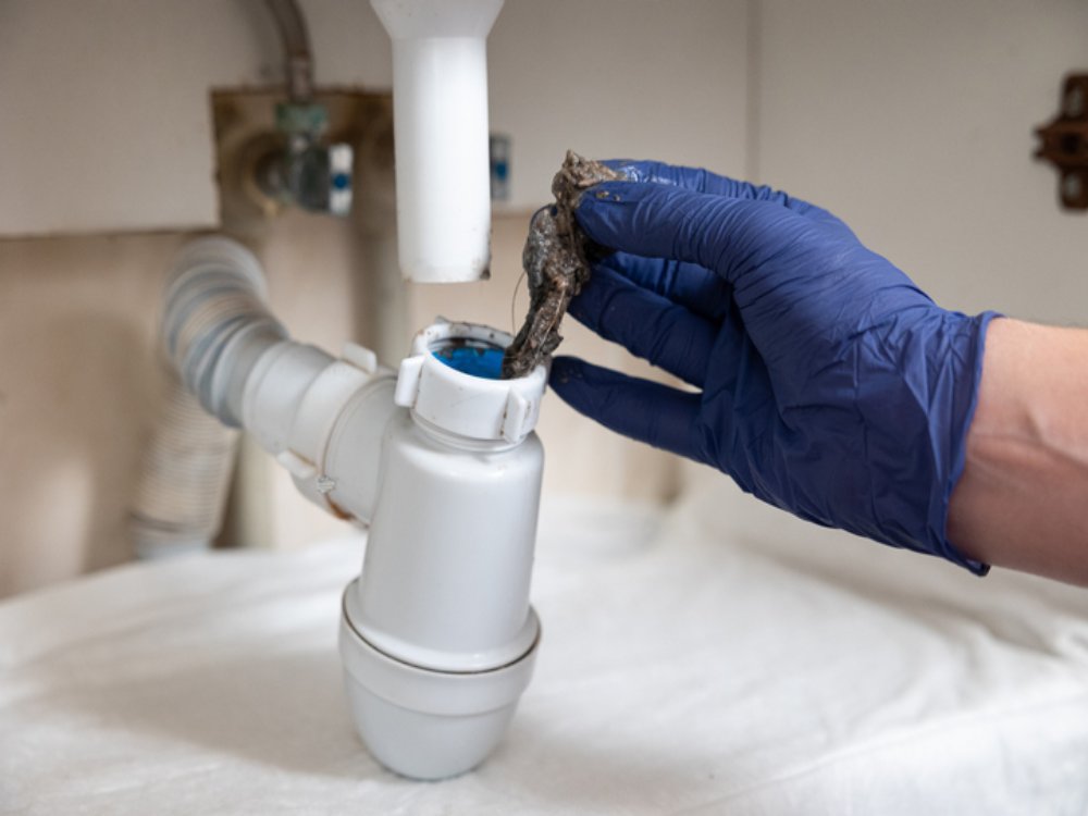 Professional pipe cleaning service removing buildup and blockages in Naperville, IL