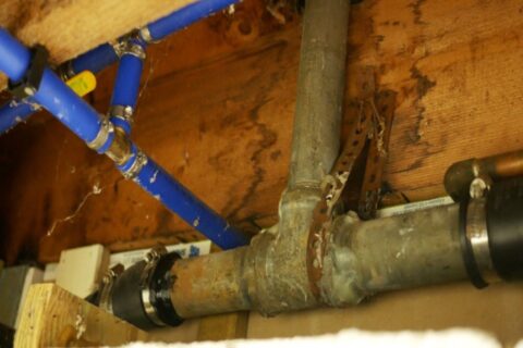 Residential galvanized metal vent pipes on a home rooftop